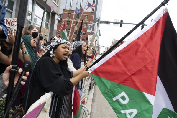 Pro-Palestinian protestors chant across the street from the United Steelworkers headquarters on Stanwix Street and Boulevard of the Allies on April 17 ahead of President Joe Bidens Visit to address the potential sale of U.S. steel to Nippon.