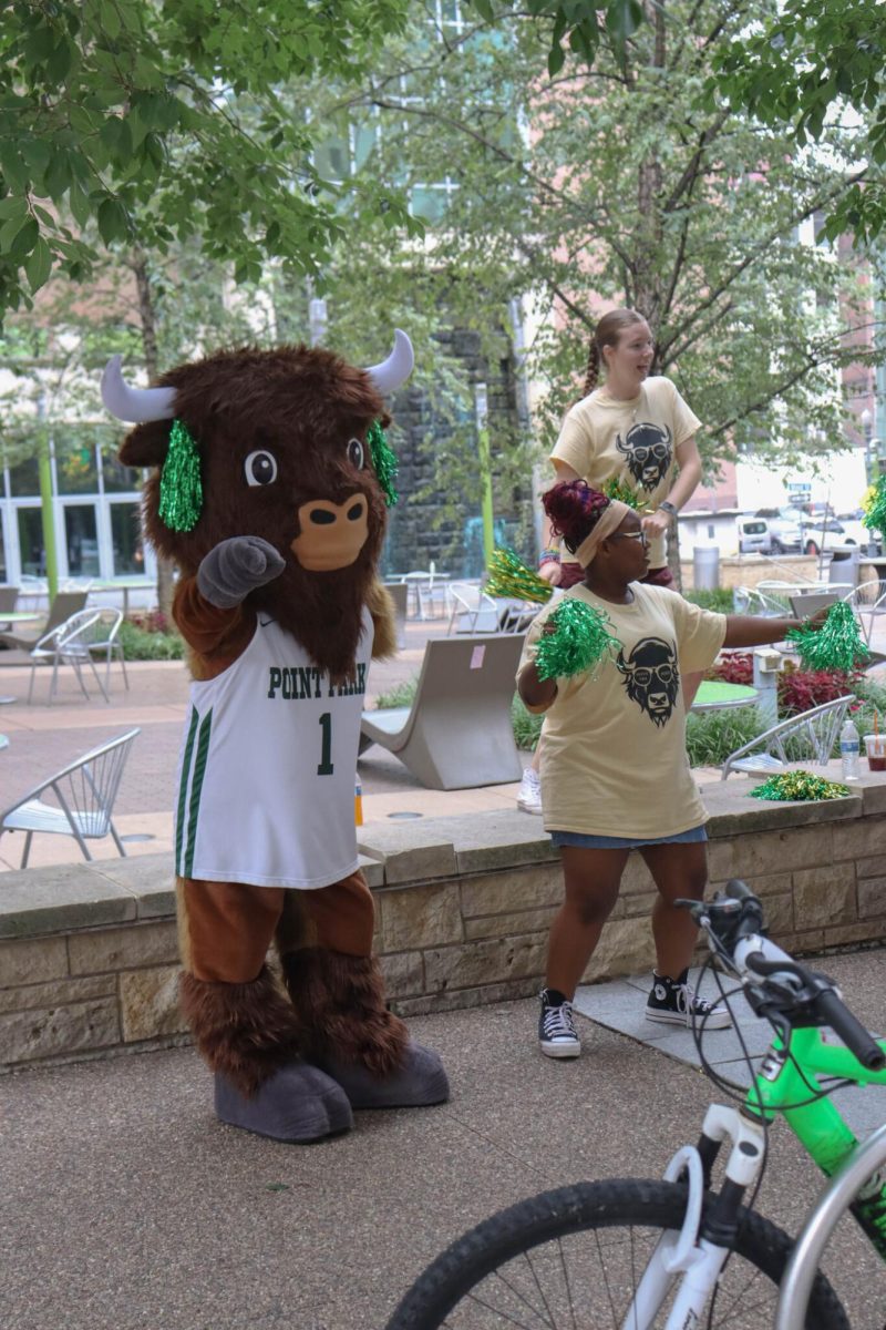 Pioneer Ambassadors with Black Diamond II hyping up students during move-in.