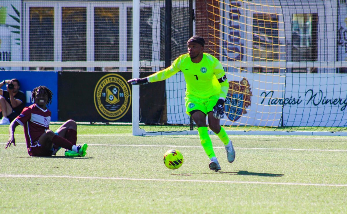 Grad student, team captain, and goalkeeper David Ali gets a save.