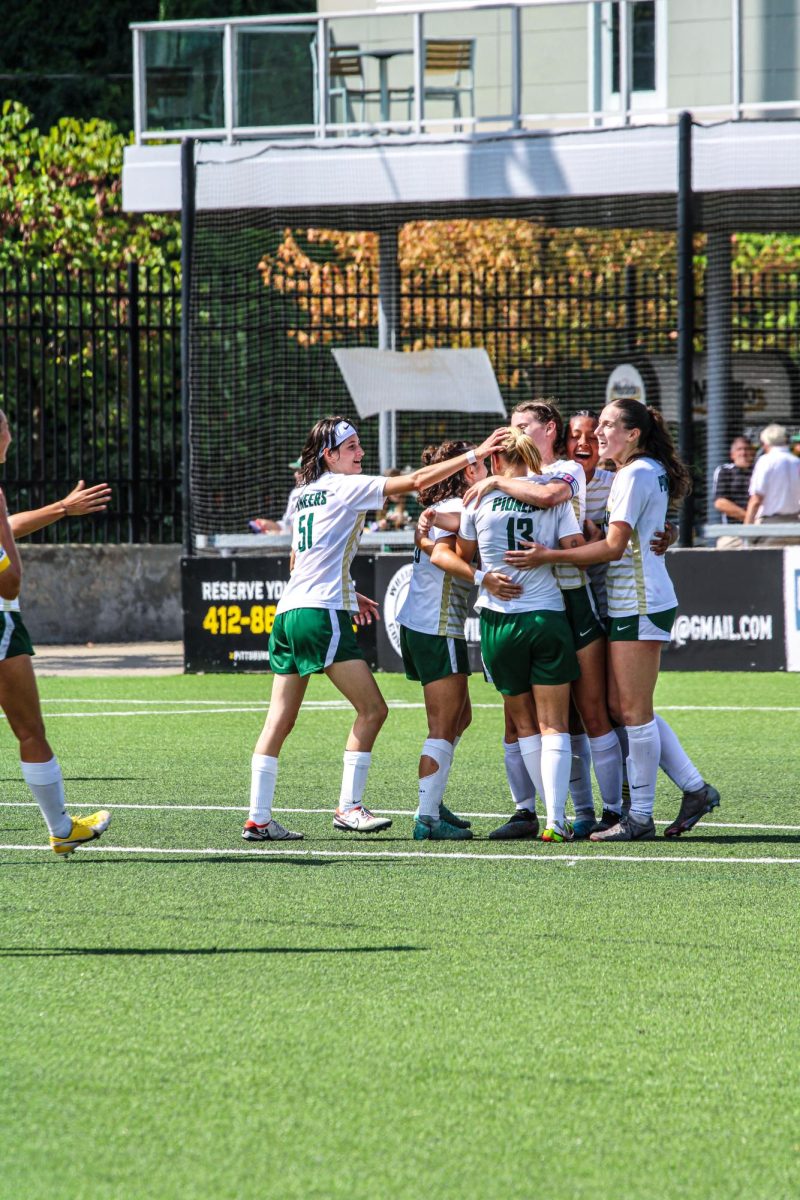 Point Park players celebrate freshman Klara Bring’s goal to tie the game.