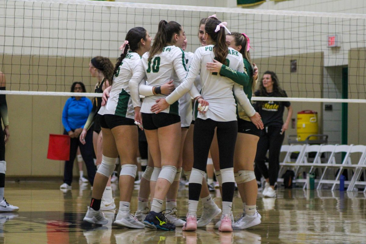 The Pioneers celebrate a point against West Virginia State on Saturday.