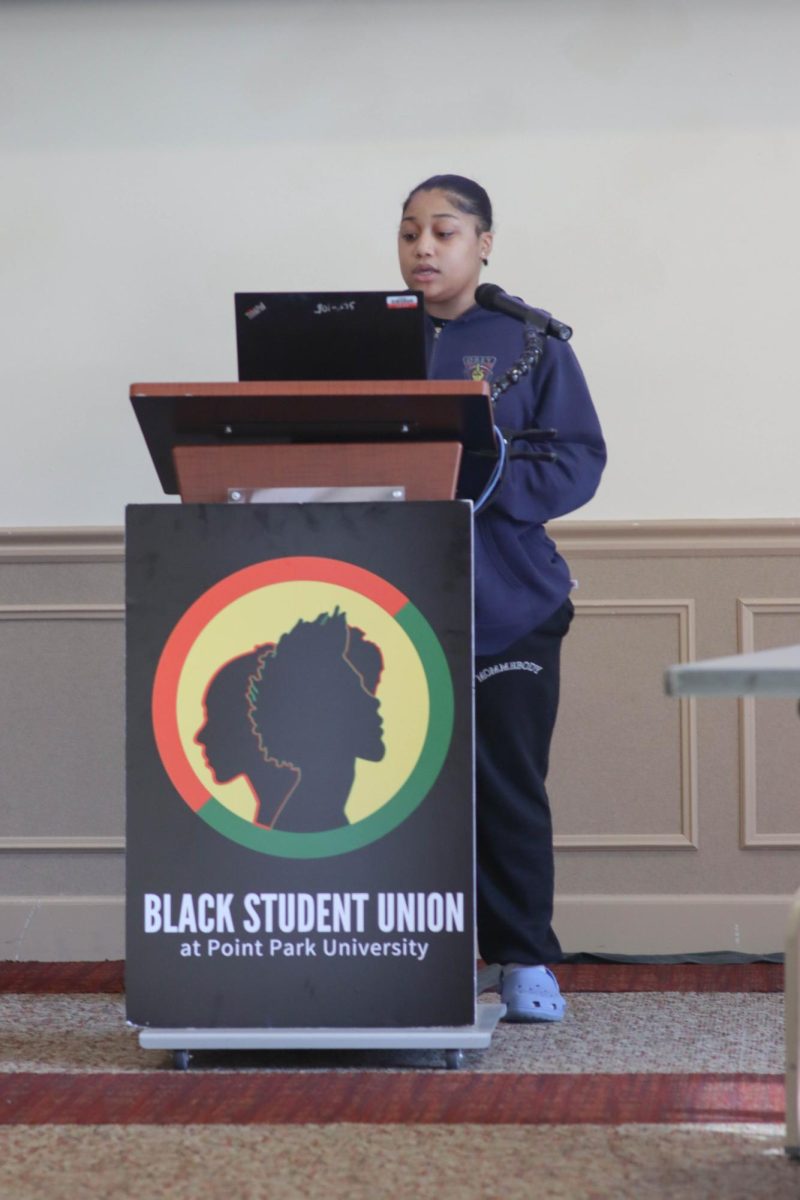 BSU Event Coordinator Amoriah Selby shares a presentation on Breast Cancer Awareness.