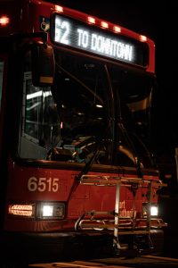 A Pittsburgh Regional Transit bus sits at a light.