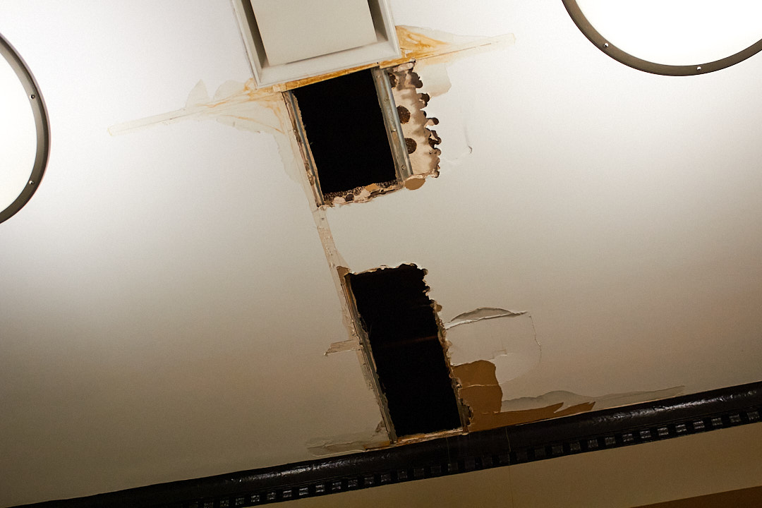 The ceiling above the checkout area in Point Cafe, which was damaged by a leaky pipe. 