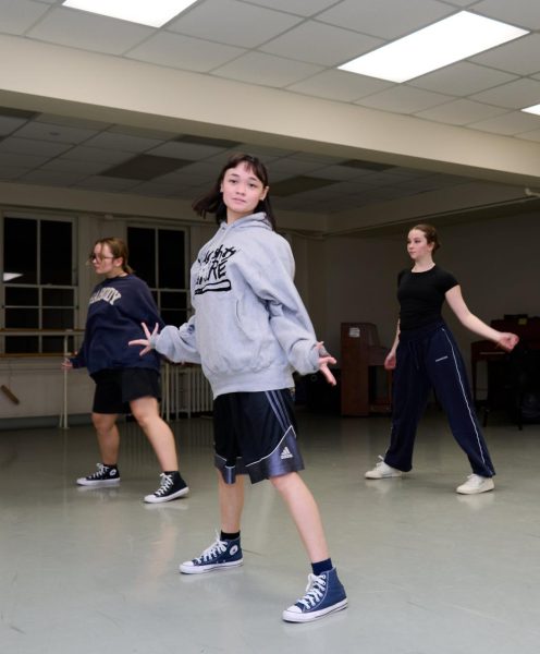 (Left to right) First-year student Amelia DiClaudio, senior Jayln Townson and sophomore Megan Lundstrom rehearse for a hip-hop performance.