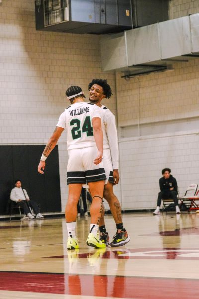 Brenden Williams and Kaden Warner celebrate a point vs. WVSU.