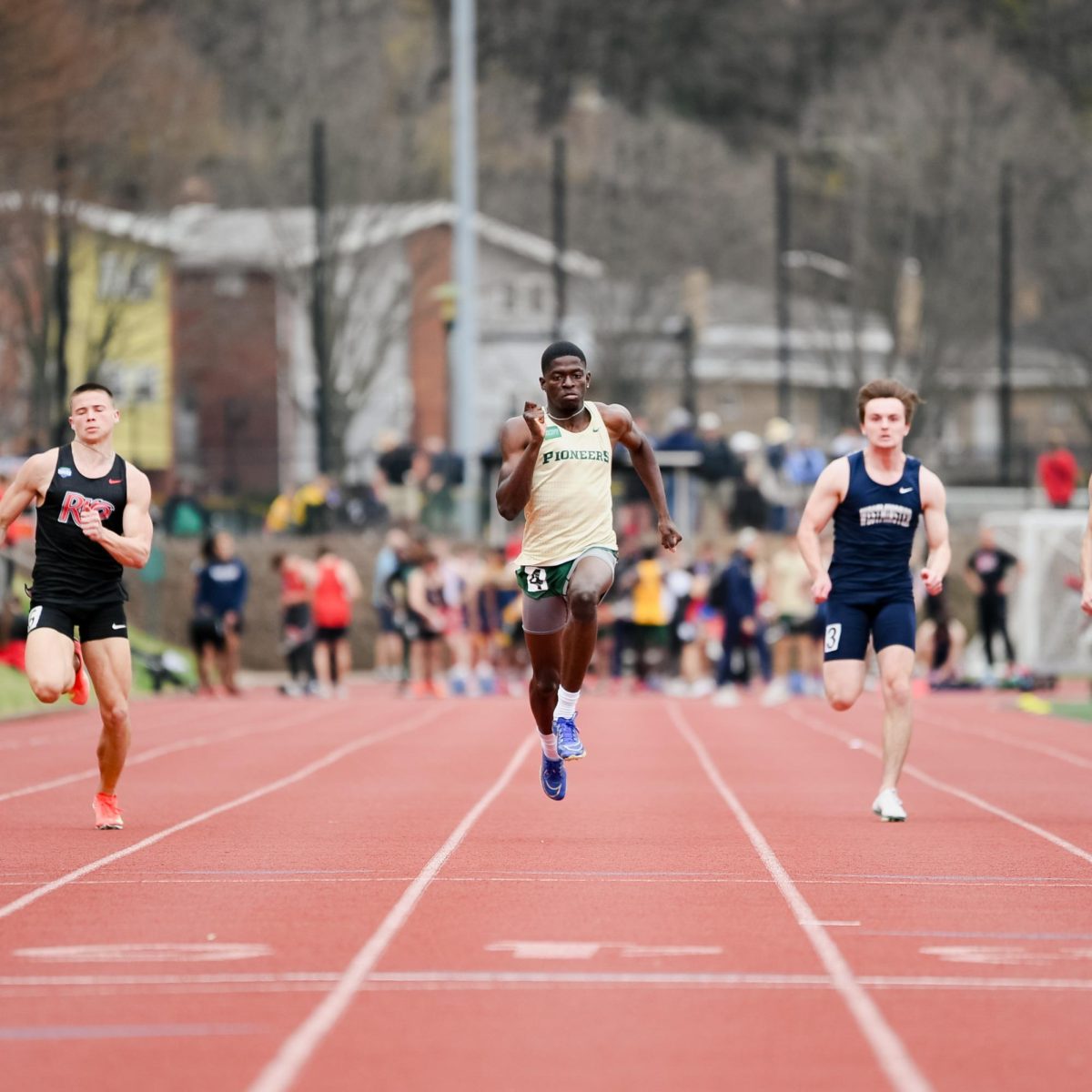 Akeem Mustapha sprints in a short-distance race at the Carnegie Mellon Invitational on March 28.