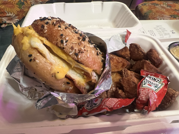 The Taylor Gang breakfast sandwich, named after Wiz Khalifa's entertainment group, is partnered with a side of home fries.