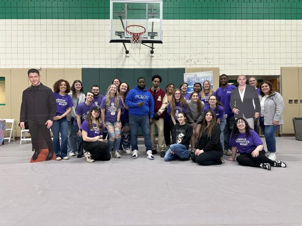 Members of the Campus Activities Board pose with cardboard cutouts of Disney actors along with guests DJ PDogg and Matthew Finley.

Courtesy of CAB
