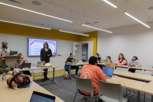 Members of the Student Government Association (SGA) listen to a presentation led by President Kyle MacLaughlin.