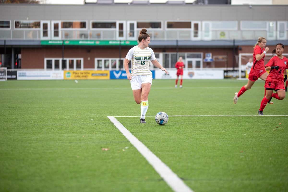 Forward Holly Pascoe dribbles upfield during her senior season on Nov. 8, 2023 at Highmark Stadium.
