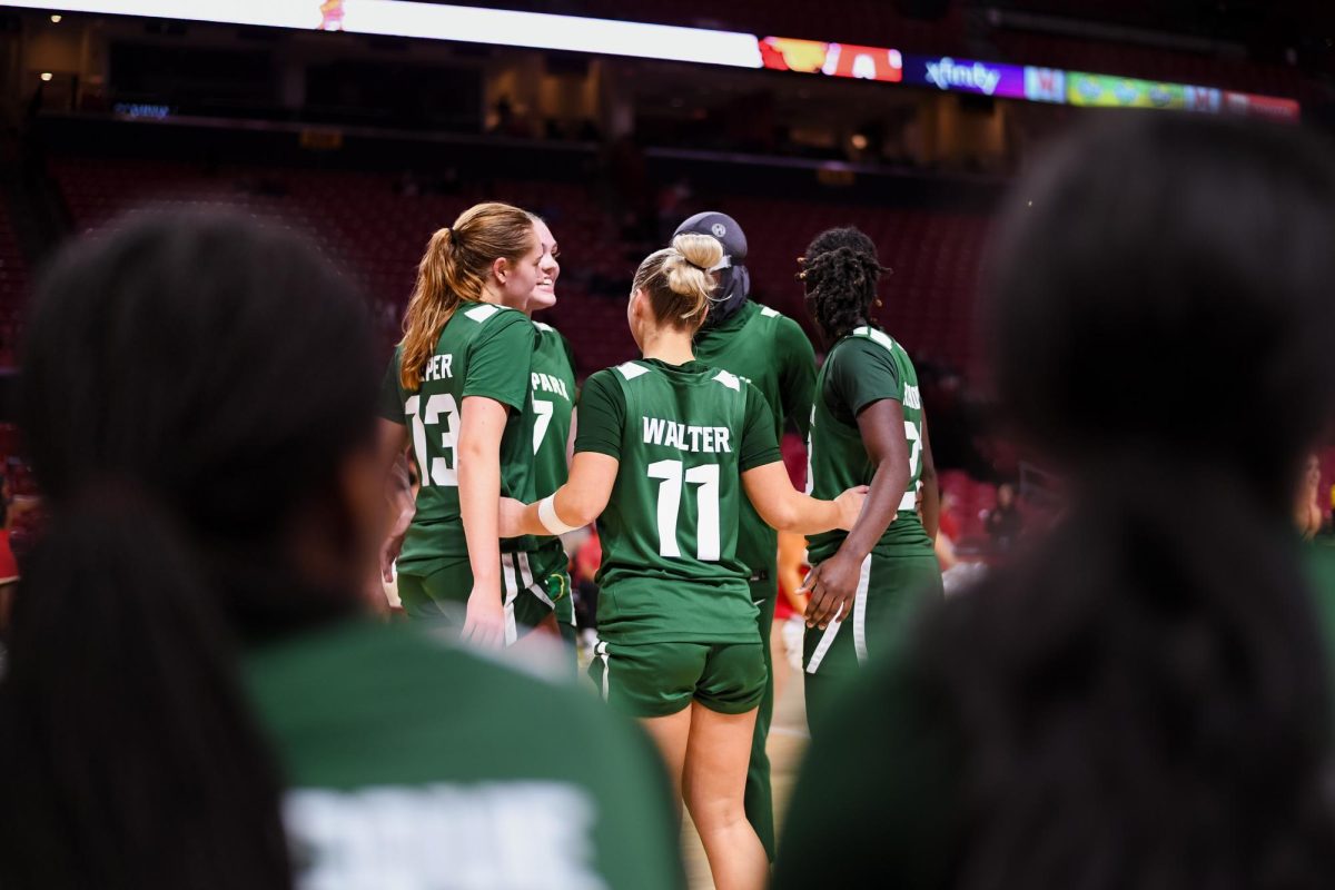 Point Park women’s basketball huddles before play vs. NCAA Division I University of Maryland in an exhibition match on Oct. 30 in College Park, Md.