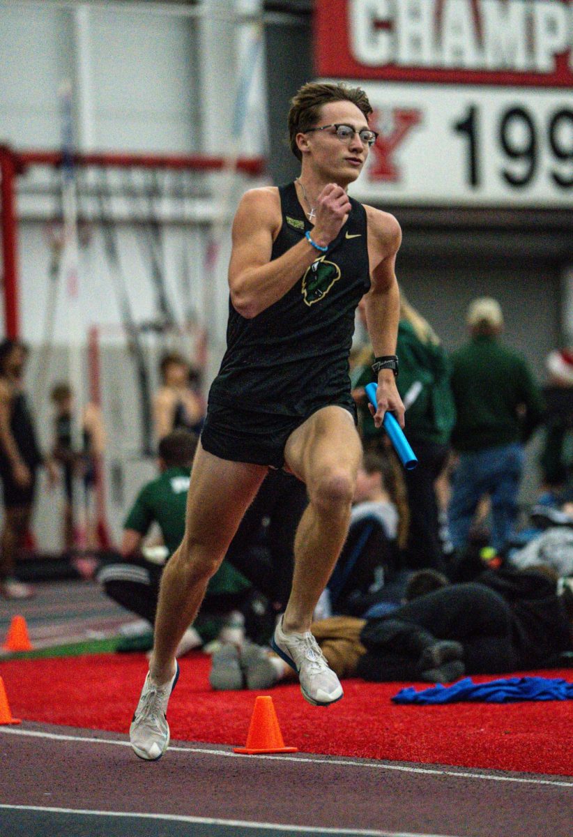 Chase Bowen competes in his leg of the 4x400-meter race during the YSU Icebreaker on Dec. 5 in Youngstown Oh.