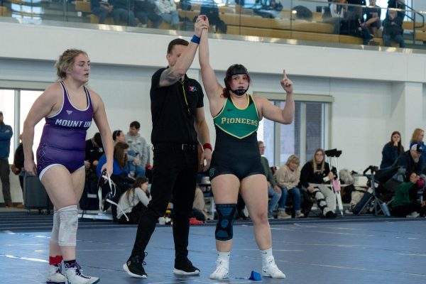 Payton Moyer defeats a Mount Union wrestler by fall at the John Carroll Open on Feb. 1.