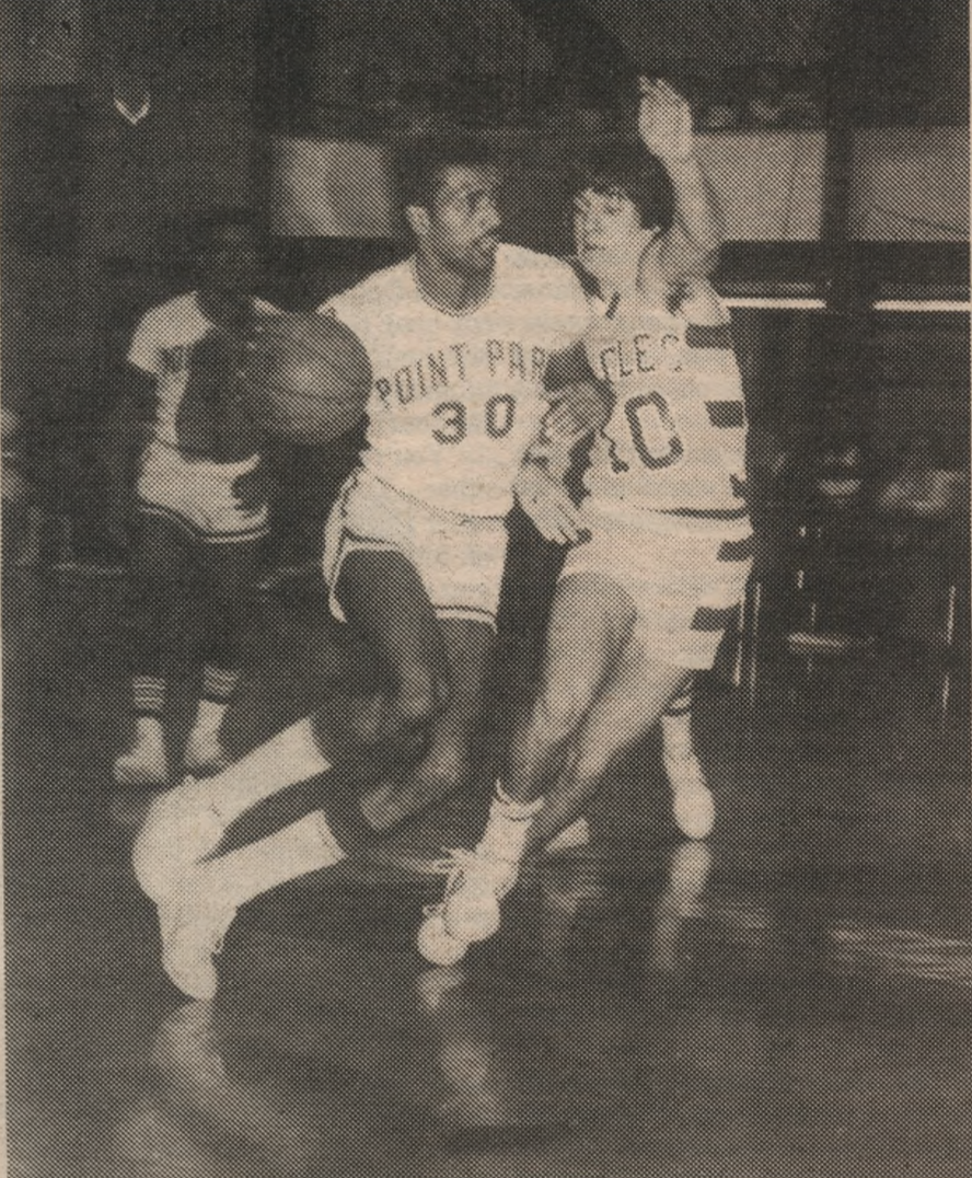 Terry Peavy out-maneuvers an Ashland opponent. Photo taken Feb. 20, 1979.